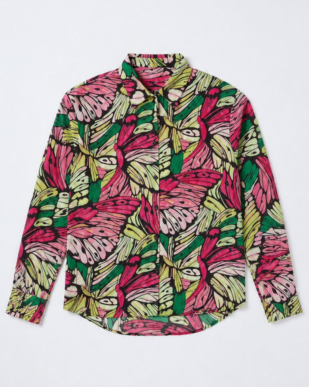 A long-sleeve button-up shirt with a vibrant, hand-drawn style abstract pattern in pink, green, yellow, and black, laid flat against a light gray background.