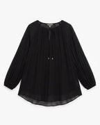 A black long-sleeve blouse with a pleated texture, gathered cuffs, and a drawstring tie neckline, shown flat against a light gray background.