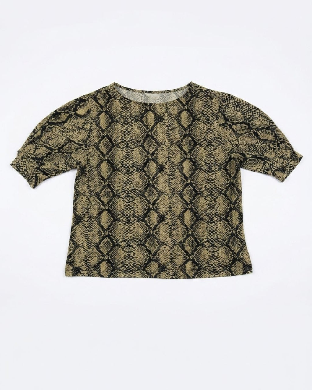A short-sleeve crop top featuring a black and olive green snakeskin pattern, laid flat against a light gray background.