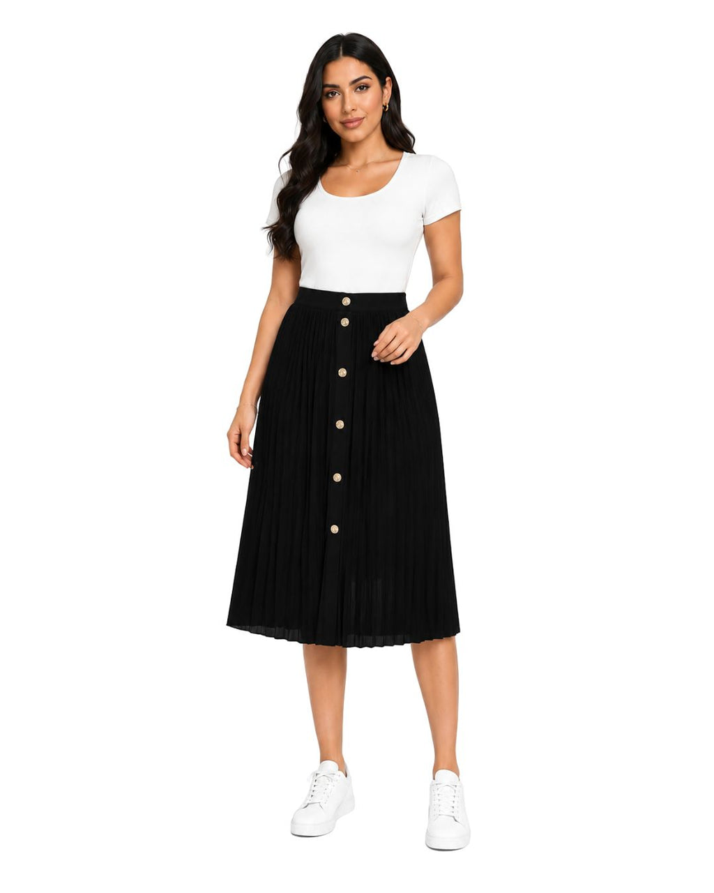 A woman modeling a black pleated midi skirt with a front button closure, paired with a white short-sleeve top and white sneakers, against a plain white background.