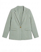 A light sage green blazer with notch lapels, flap pockets, and a single gold button, shown flat against a white background.